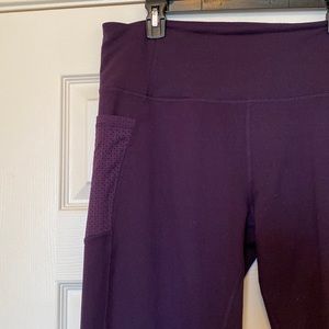 High Waist Purple Gym leggings with mesh pockets & zipper detail
